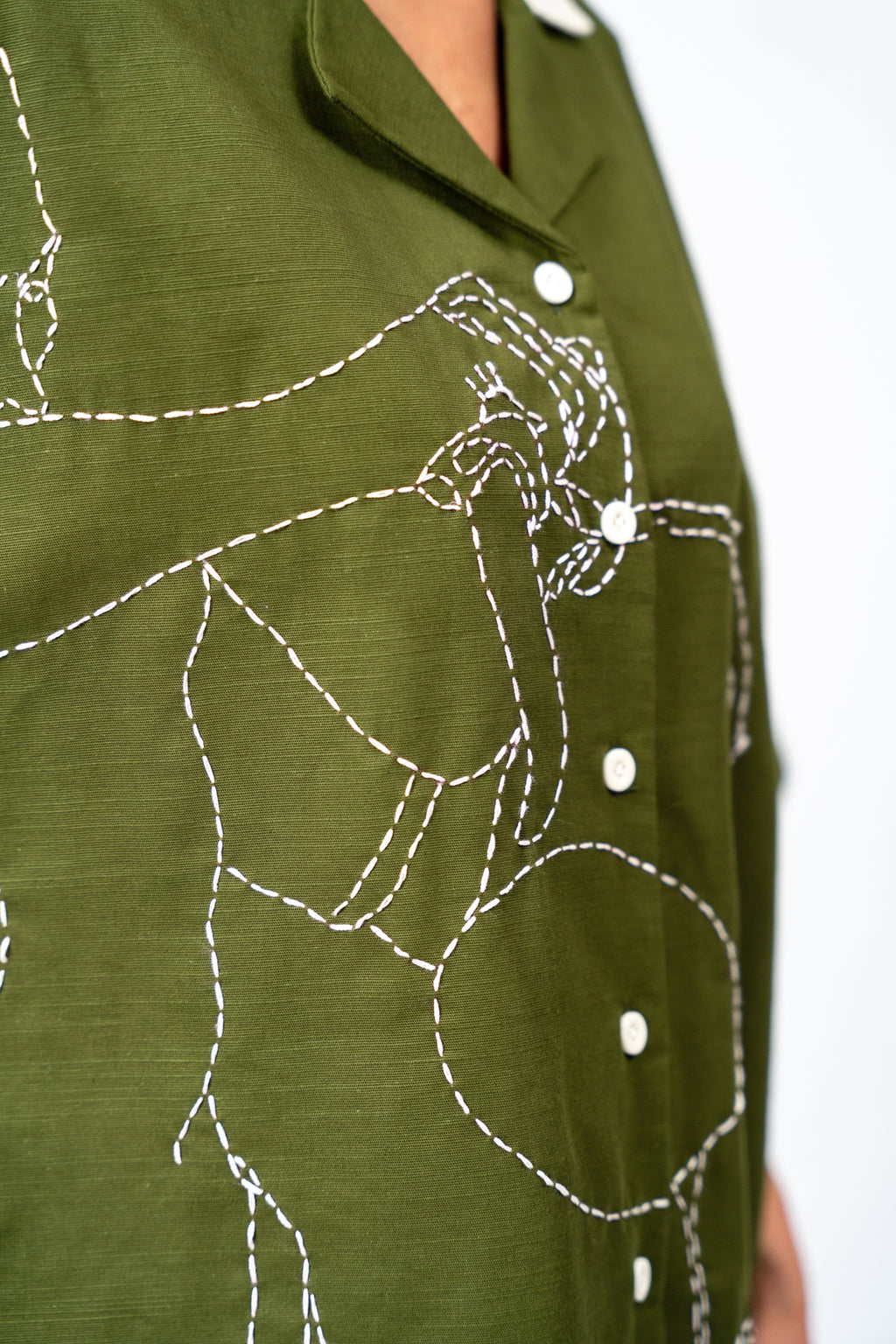 Hand Embroidered Portrait of a Figure Pouring Tea