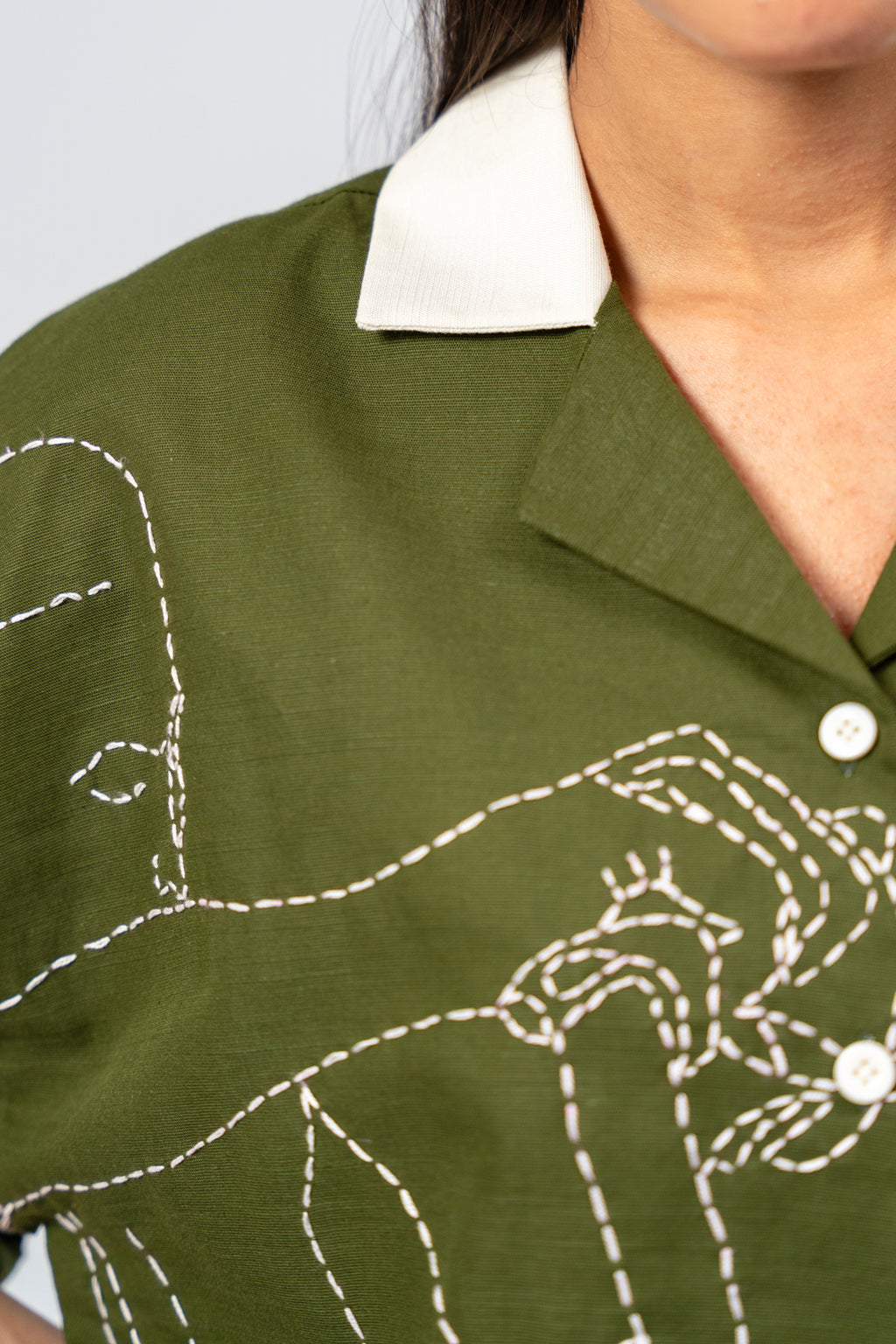 Hand Embroidered Portrait of a Figure Pouring Tea