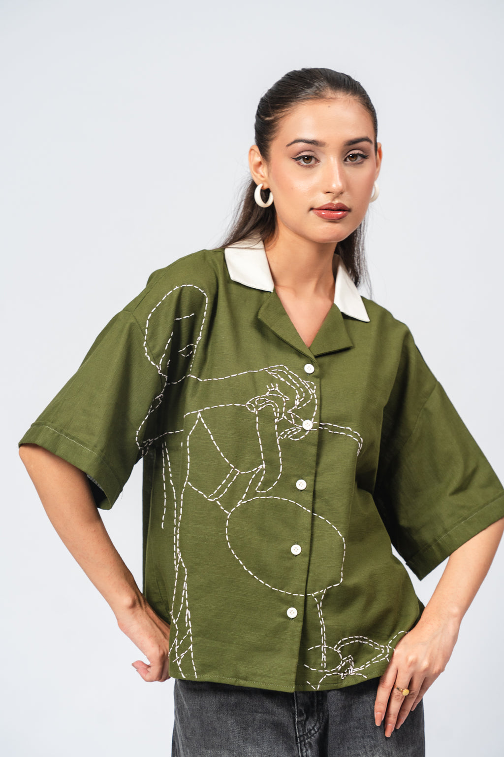 Hand Embroidered Portrait of a Figure Pouring Tea